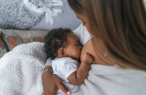 Mother receiving lactation consultant support