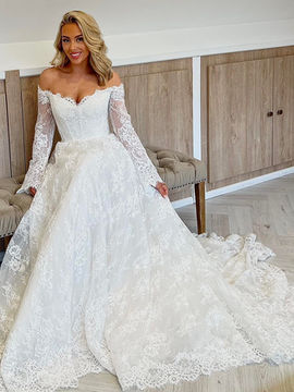 Bride sitting on bench 