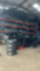 black car getting tyres changed