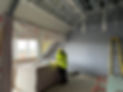 Building site with a worker inspecting it