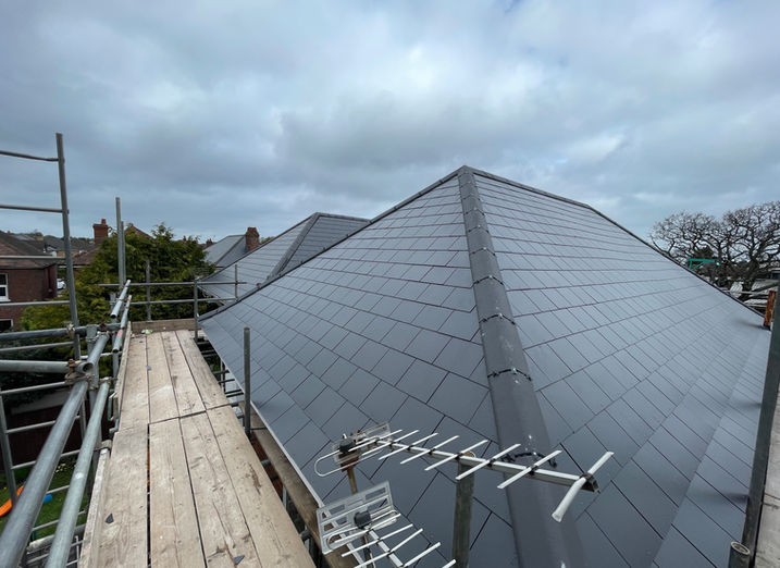 Newly fitted dark roof with clean lines