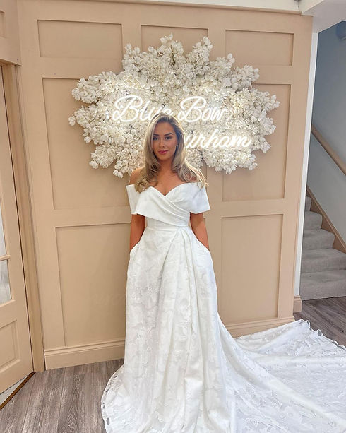 Beautiful bride in bridal shop