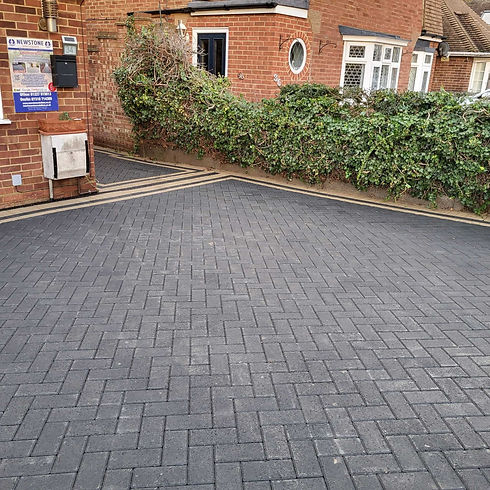 Professional block paving creating an attractive entrance