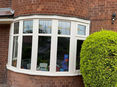 Bay window with white casement windows 