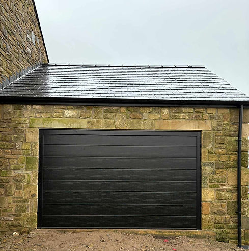 Modern garage door installation in Blackburn
