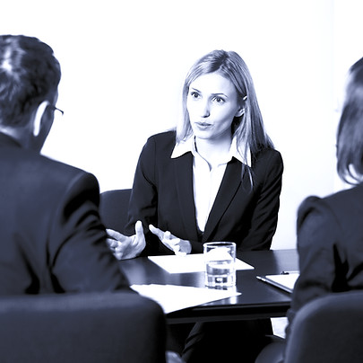 Pretty young woman in meeting