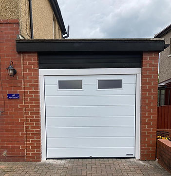 White electric double sectional garage door