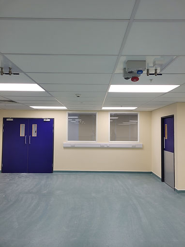 A sterile, empty room with cream walls