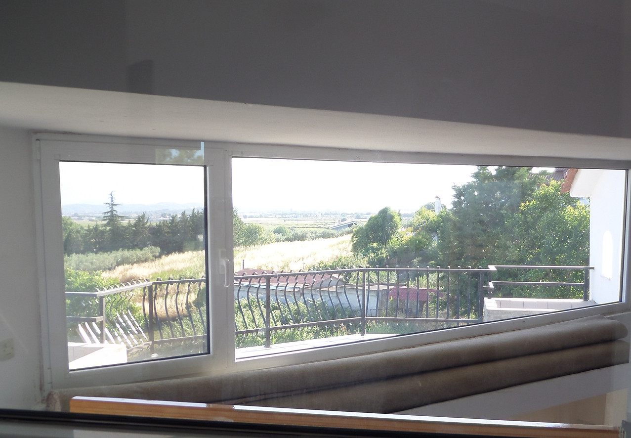 Fascinating view of OLYMPUS, the city of Katerini, the Pierion mountain range and surroundings from the interior glass of the master bedroom #2.