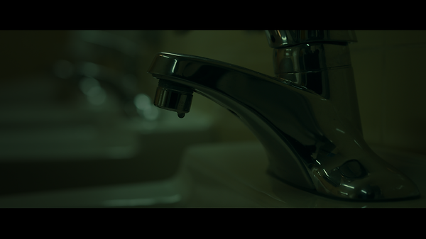 Bathroom still Speech still of Andrew Rudy Galindo from Sana, Sana Short Film