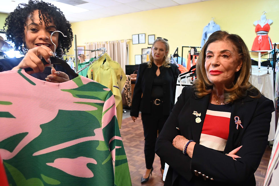 Sheneka with Mayor Berkley at her boutique 1QTee