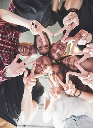 happy-group-friends-with-their-hands-together-middle_146671-15286.jpg