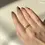 Thumbnail: Diamond Set in Layering Waves in 18k Gold Ring