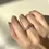 Thumbnail: Diamond Set in Layering Waves in 18k Gold Ring