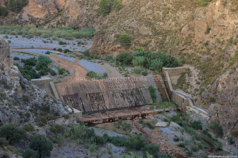 Full-frame 3:2 authentic landscape photograph of a dry man-made waterfall on El Rio Guadalfeo east of Tijola, Las Alpujarras - straight photography with no colour enhancement, ideal for hotel decor.