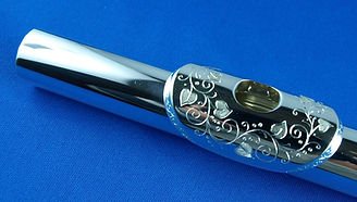 Kopfschraube einer Querflöte
handgraviert