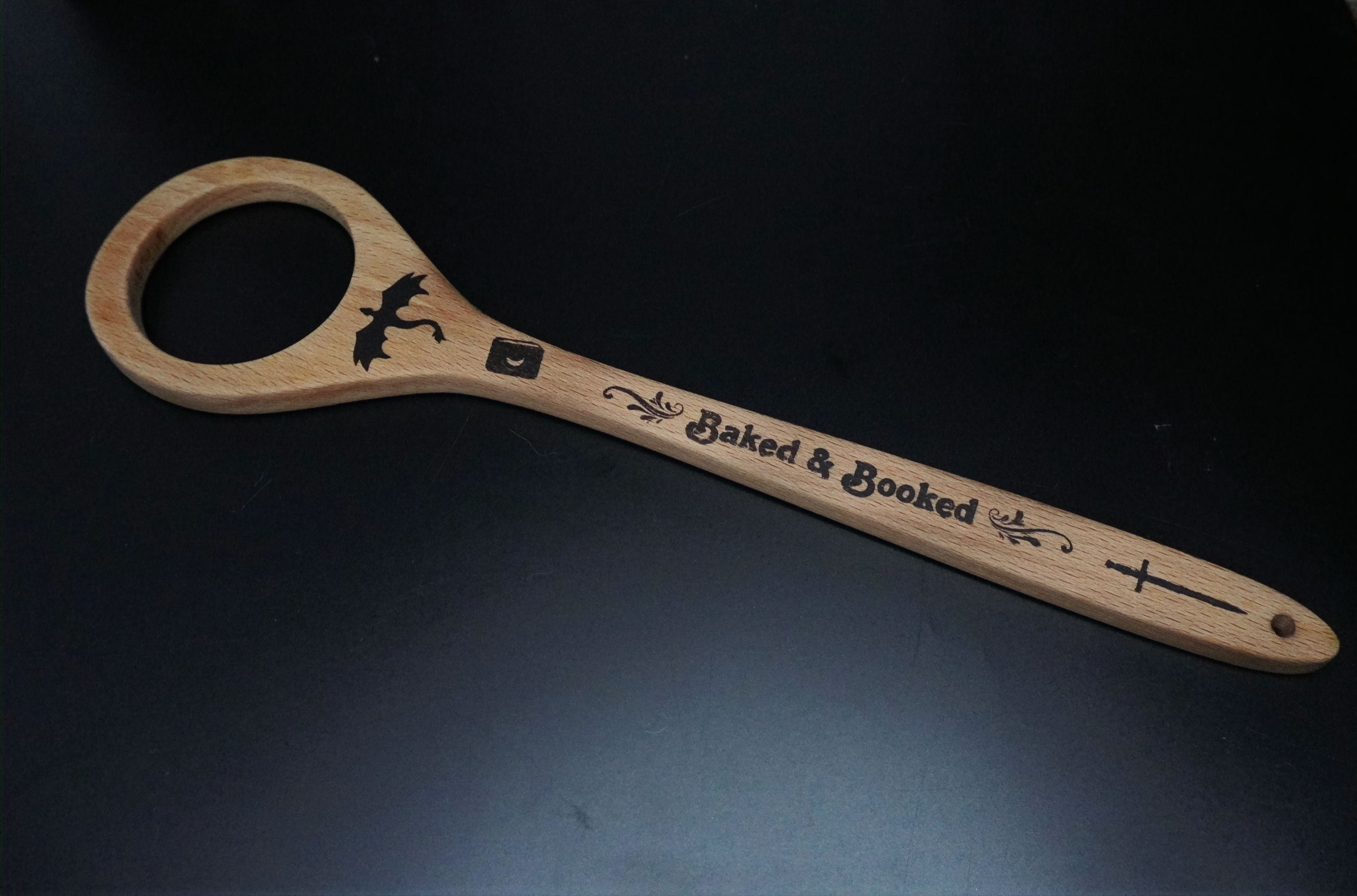 Baked and Booked Wooden Whisk