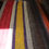 Thumbnail: Handwoven wool poncho with a V-neck opening.PN129