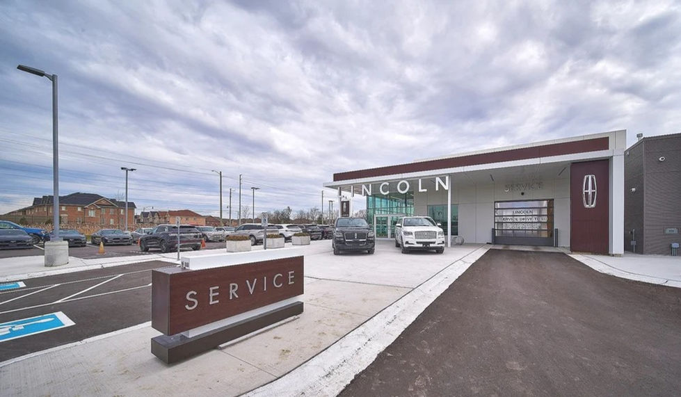 Lincoln dealership service center entrance with branded signage