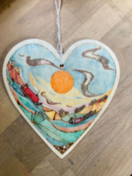 Wood burned heart. Large ‘murmuration’ 