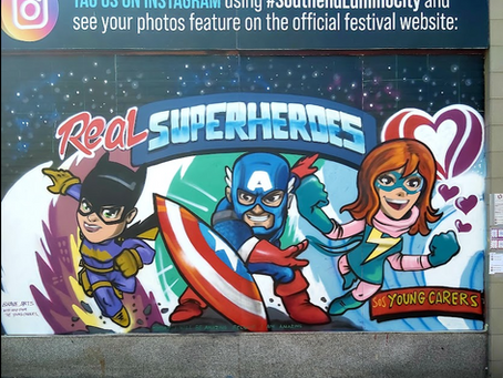 Young carers week. mural in the high street. Super hero theme