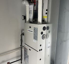 White furnace unit with pipes