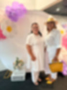 Two members of the evolution family at an event booth.