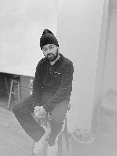 Harry Grover wears HOPE Pullover Jacket