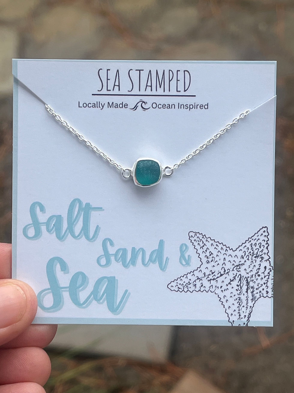 Thumbnail: teal dainty sea glass bracelet on card