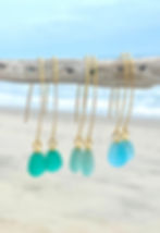 gold eclipse earrings together