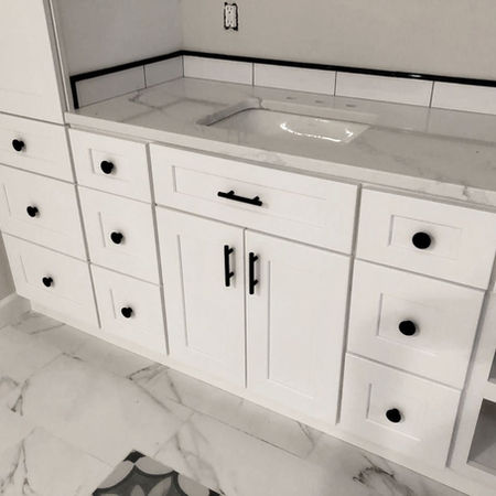 Final look at the completed custom bathroom vanity by Triangle Repairs LLC.