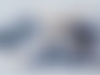 a hand holding a key that is also a smartphone