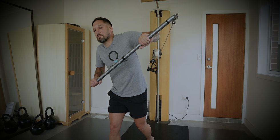 Steve demonstrating a corrective exercise with a Functional Patterns bar at Penrith Biomechanics