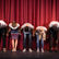 5 drama students taking a bow on stage.