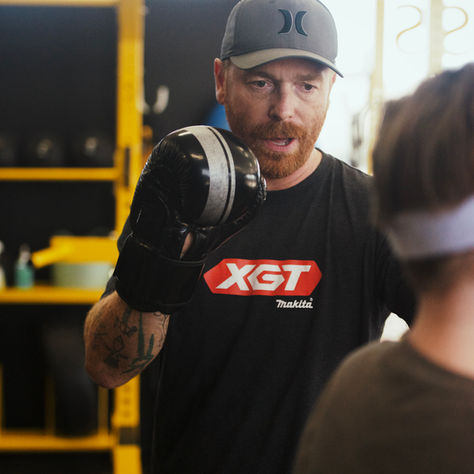 Father and son training together in a boxing class at MBS Fitness Bridgewater