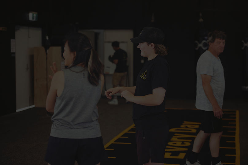 Members of MBS Fitness preparing for a boxing and strength training session_edited.jpg