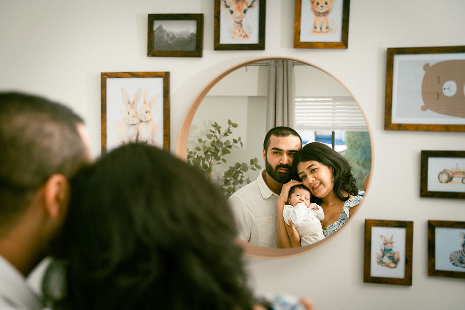 in home newborn photography session in surrey , new parents posing with newborn baby in Baby Nursery Ideas