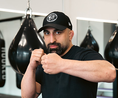 male boxing coach hooked boxing and fitness.jpg