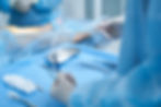 Doctor preparing for vein surgery in modern clinic.jpg