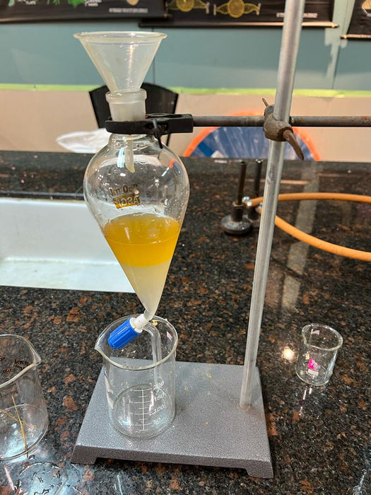 CreatED student learning conducting the gravimetric assessment.