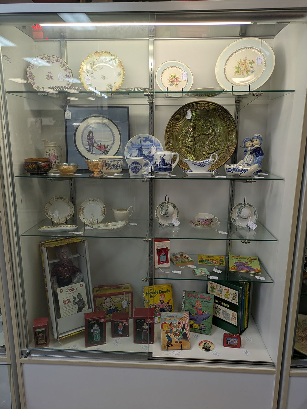 Our display case at Needful Things Antique Mall