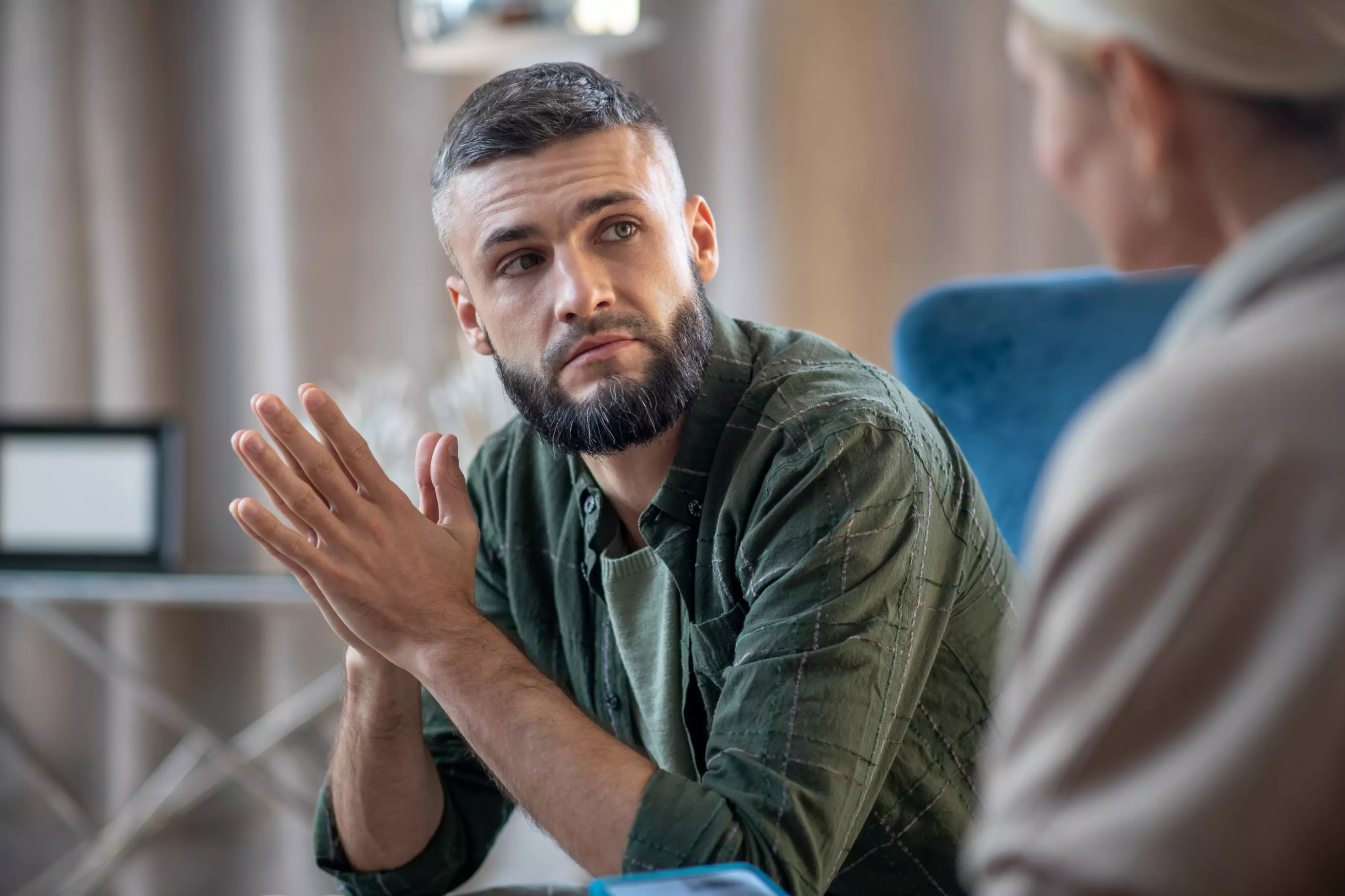 Man with trauma and PTSD being treated with hypnotherapy and counselling.webp