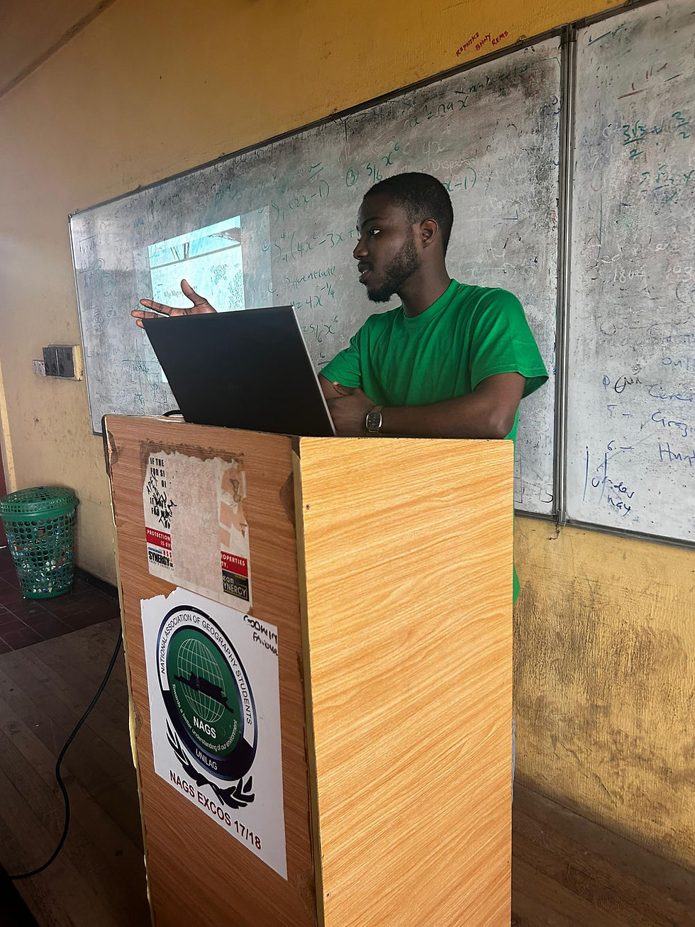 Figure 2: Photo of me onboarding new members, taken by Max, Unilag YouthMappers Chapter, 2025.