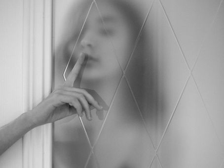 Woman silently holding back a personal secret.
