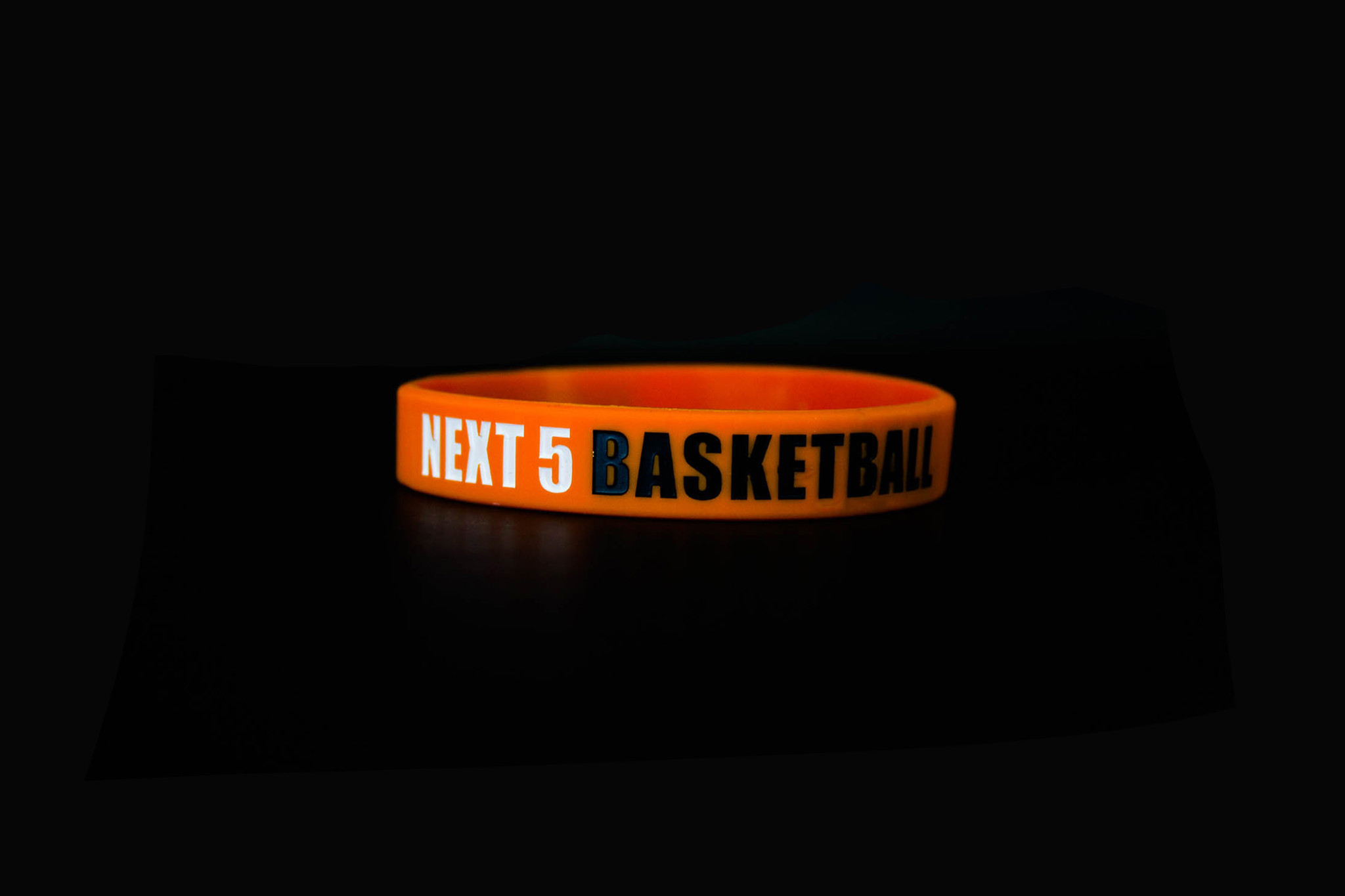 NEXT 5 BASKETBALL - HARD WORK IS UNDEFEATED WRISTBAND - ORANGE