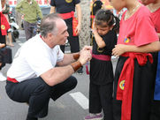 A 5-year-old girl who doesn't want to leave her parents before class.
