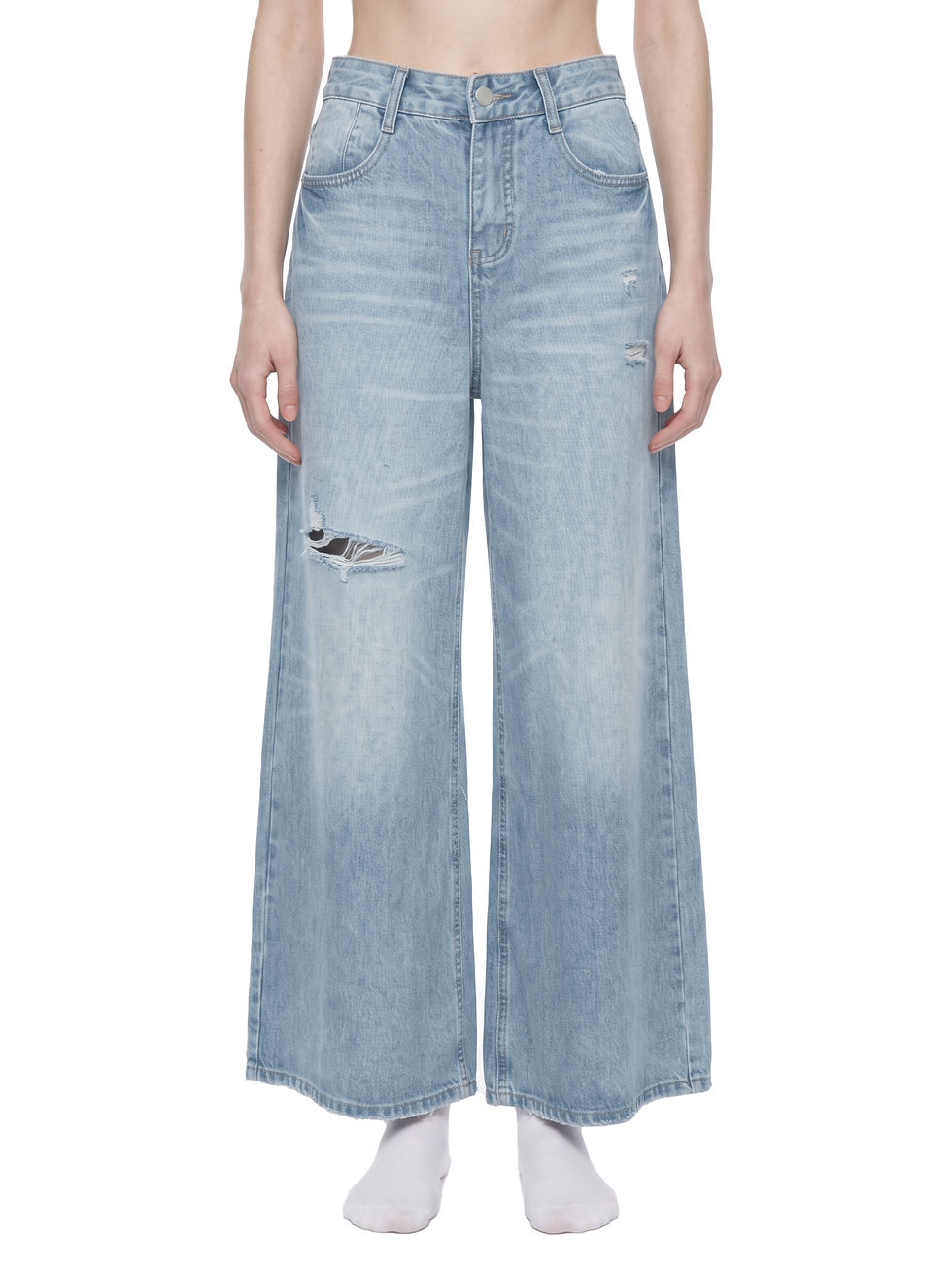 Front view of women's vintage blue wash wide leg jeans with ripped distressed knees and whiskering