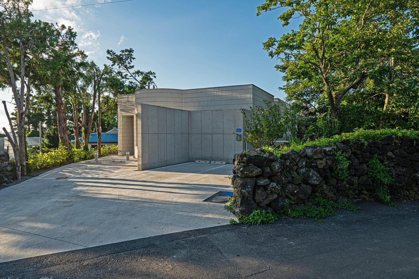 Rhythm house entrance facade in jeju island, South Korea