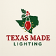 Green state of Texas with business name and Red Christmas light bulb 