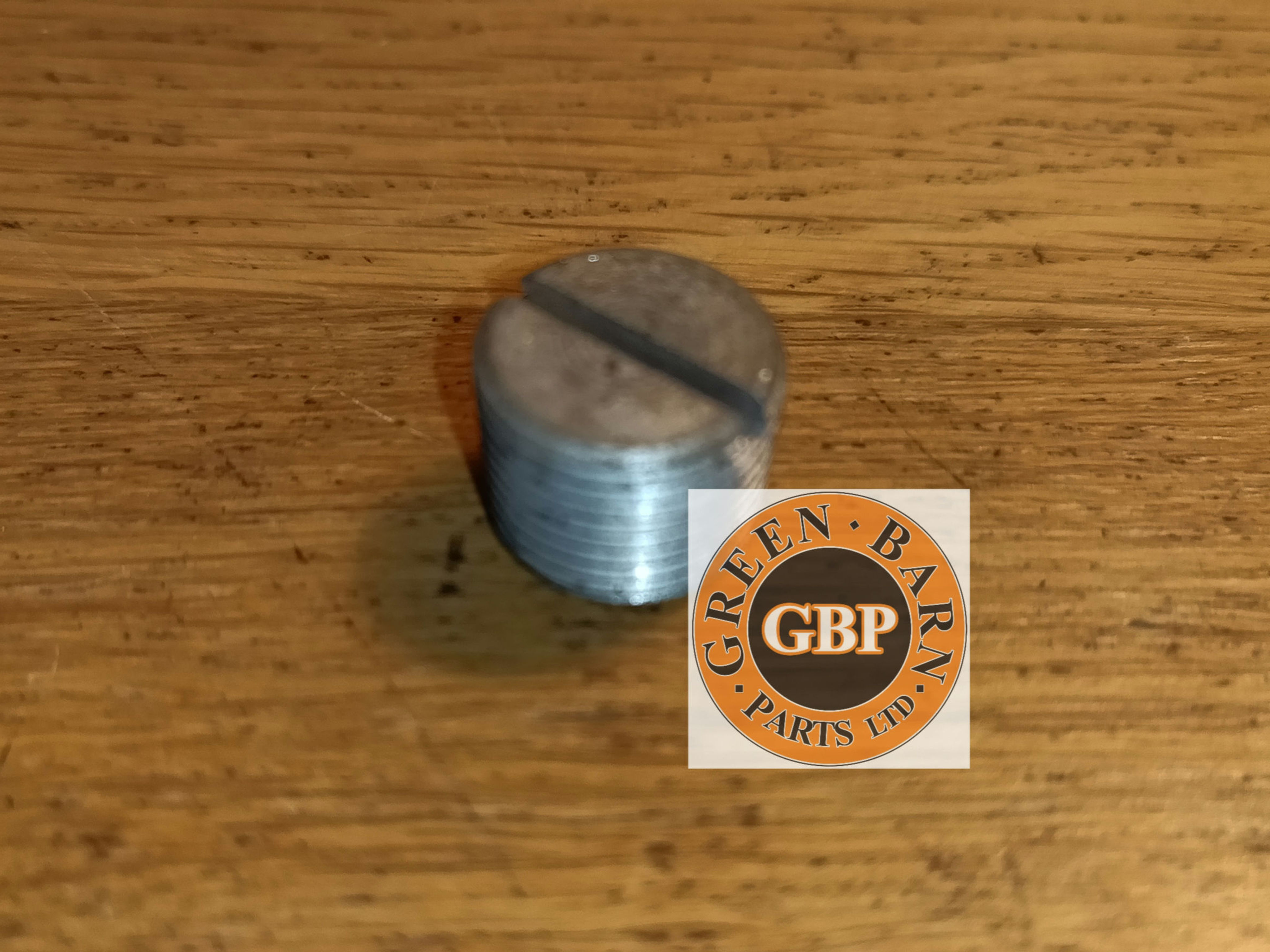 Banjo front axle swivel plug (NOS)